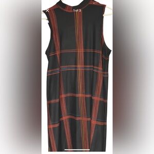 Apt 9 dress size M very cute and comfortable.  For work or play.